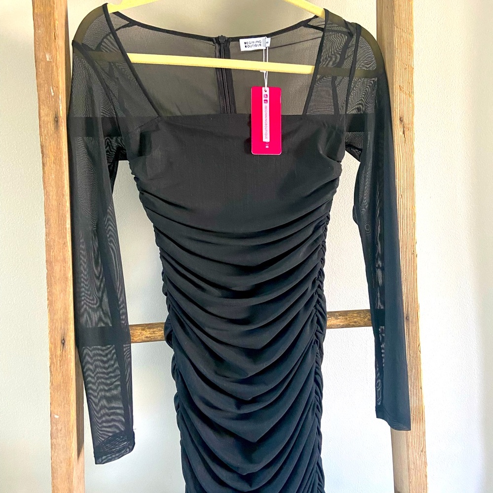 Beginning Boutique cocktail or homecoming dress.